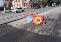 На улице Ангарской ведется подготовка к укладке финишного слоя нового покрытия автодороги